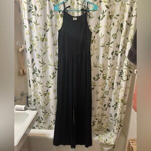 Pact “Soirée One‑And‑Done” Black Smocked Flare Jumpsuit – M – Organic Cotton